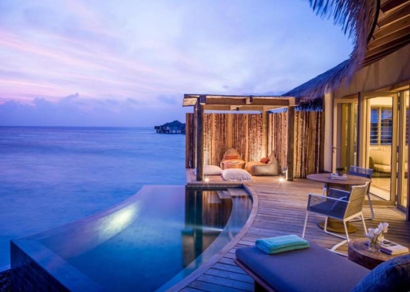 sunset overwater pool villa