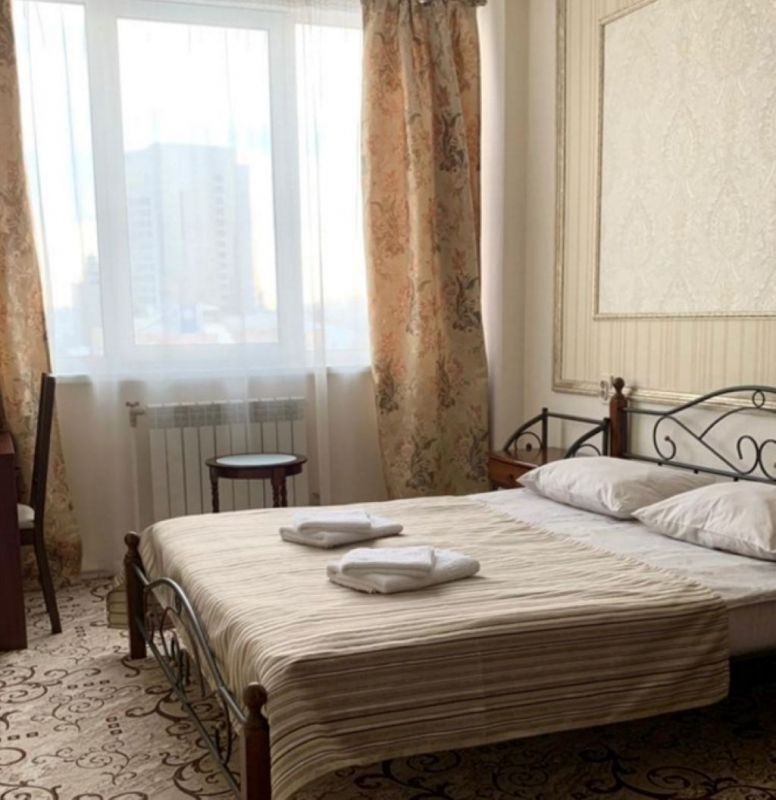 делюкс