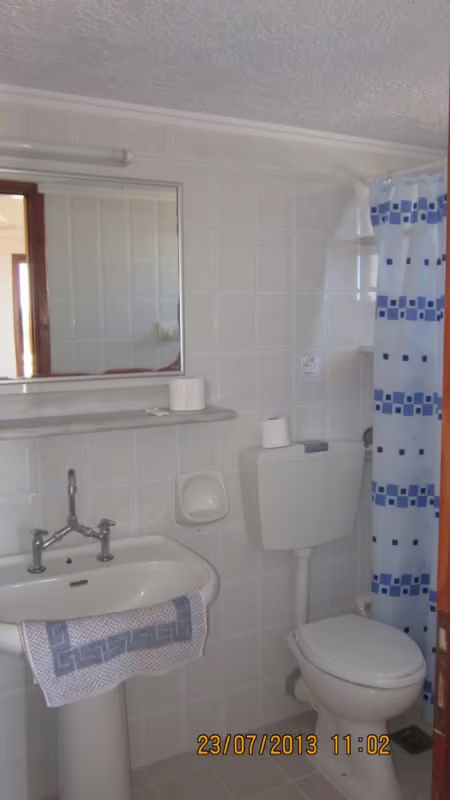 ADONIS APARTMENTS