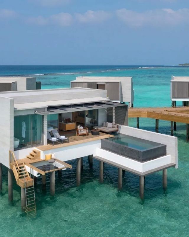 sunset overwater villa with pool